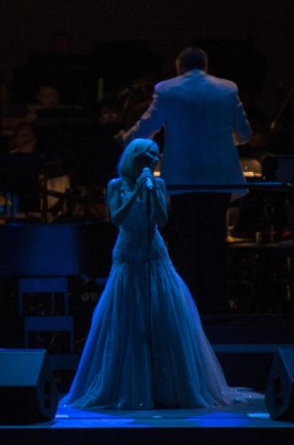 Singer and actress Kristen Chenoweth performs "Moon River" Friday at the Hollywood Bowl in her headlining performance with the Los Angeles Philharmonic conducted by Kevin Stites. ///ADDITIONAL INFO: chenoweth.0824 - 8/23/13 - Photo by MIGUEL VASCONCELLOS / FOR THE ORANGE COUNTY REGISTER - Review of Tony-winning singer and actress Kristen Chenoweth in the first of two headlining appearances at the Hollywood Bowl. Please also try to get a few fan pics to mix up the slideshow. Probably a soundboard shoot, as usual.. - GENERIC CAPTION